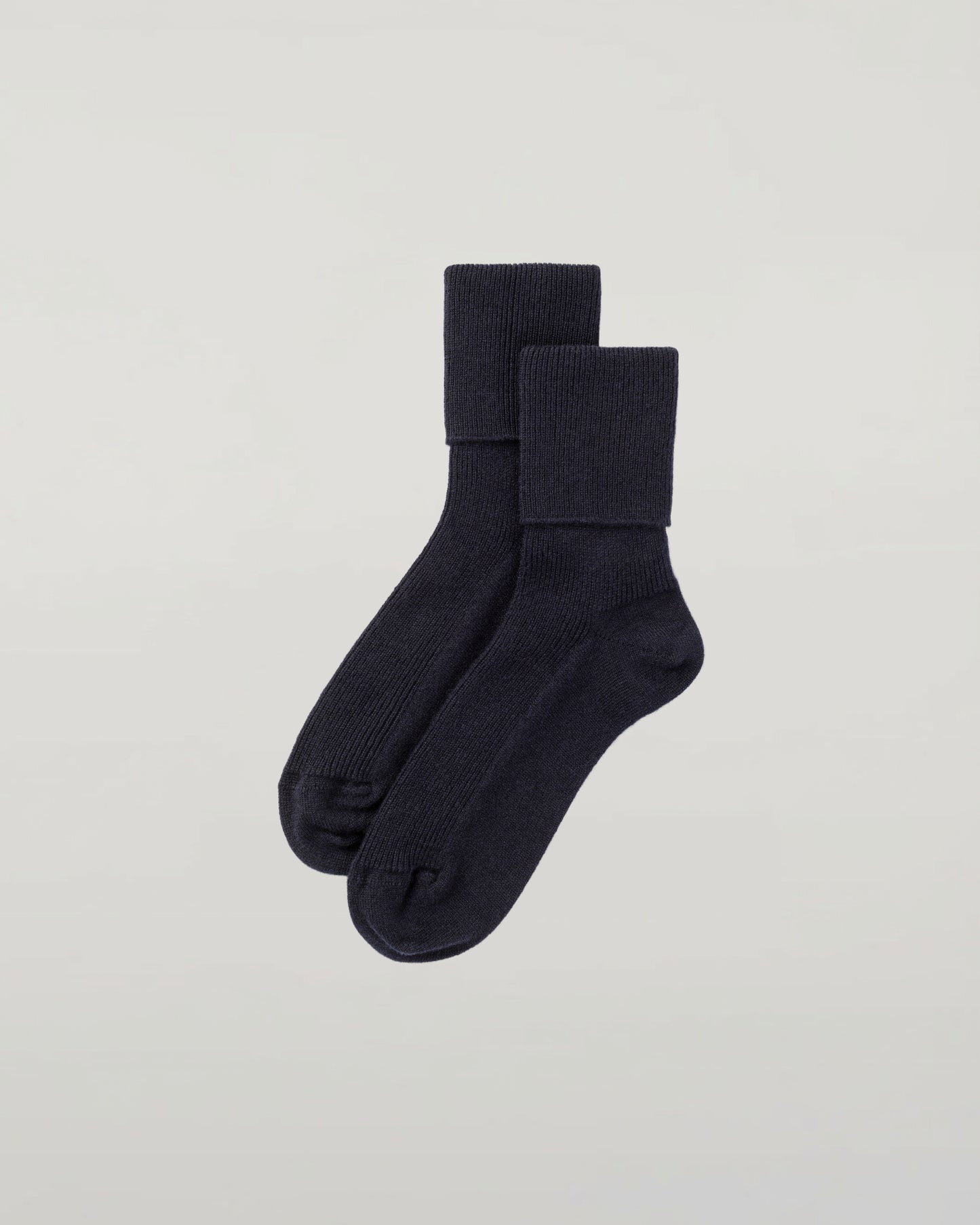 Johnstons of Elgin set of three pairs of cashmere socks in light blue, white, and navy on a white background 2025GIFTSET3B