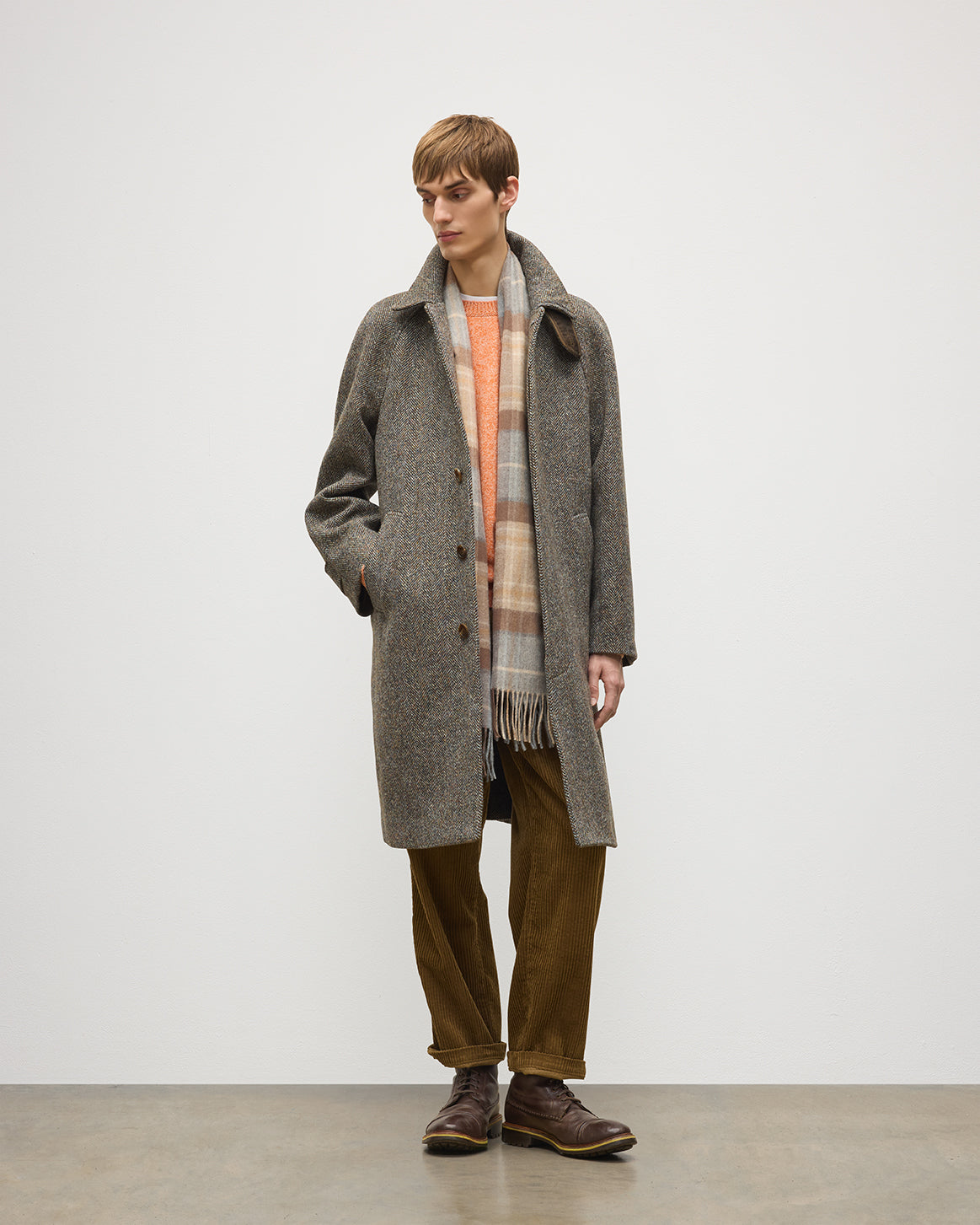 Model wears Johnstons of Elgin AW25 Woven Accessories Natural MacKellar Natural MacKellar Tartan Wide Cashmere Scarf WA000057KU0542ONE