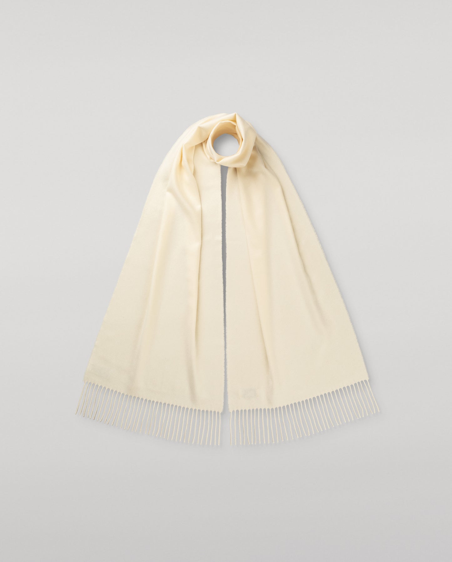Johnstons of Elgin Oversized Cashmere Scarf in White on a white background WA000057SA0000N/A