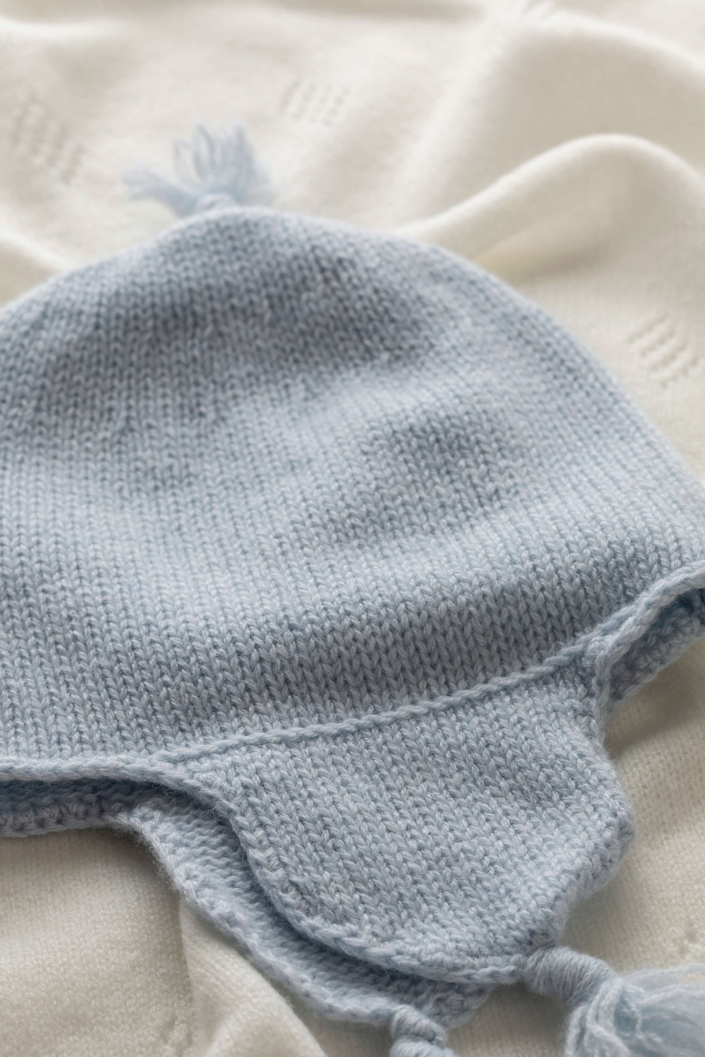 Johnstons of Elgin Baby Handknits Powder Blue Cashmere Baby Hat with Tassel JA000139SD0167ONE