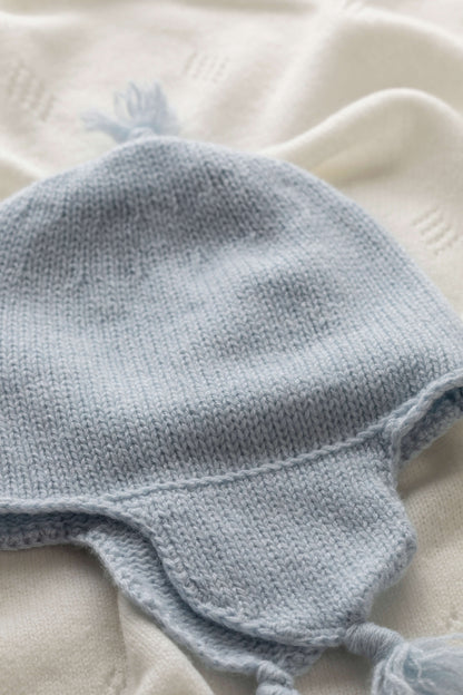 Johnstons of Elgin Baby Handknits Powder Blue Cashmere Baby Hat with Tassel JA000139SD0167ONE