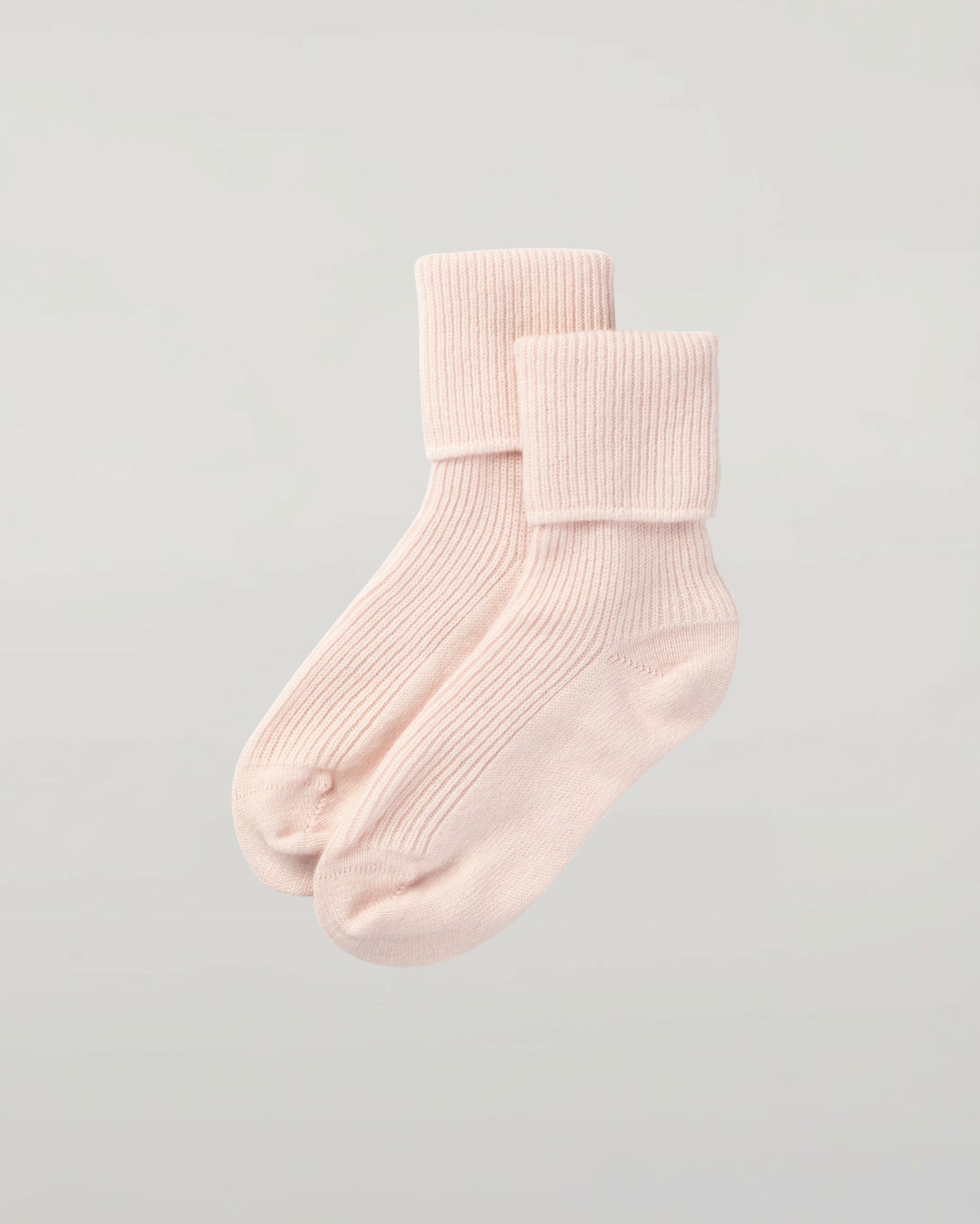 Johnstons of Elgin set of three pairs of cashmere socks in pastel colours on a light grey background 2025GIFTSET3A