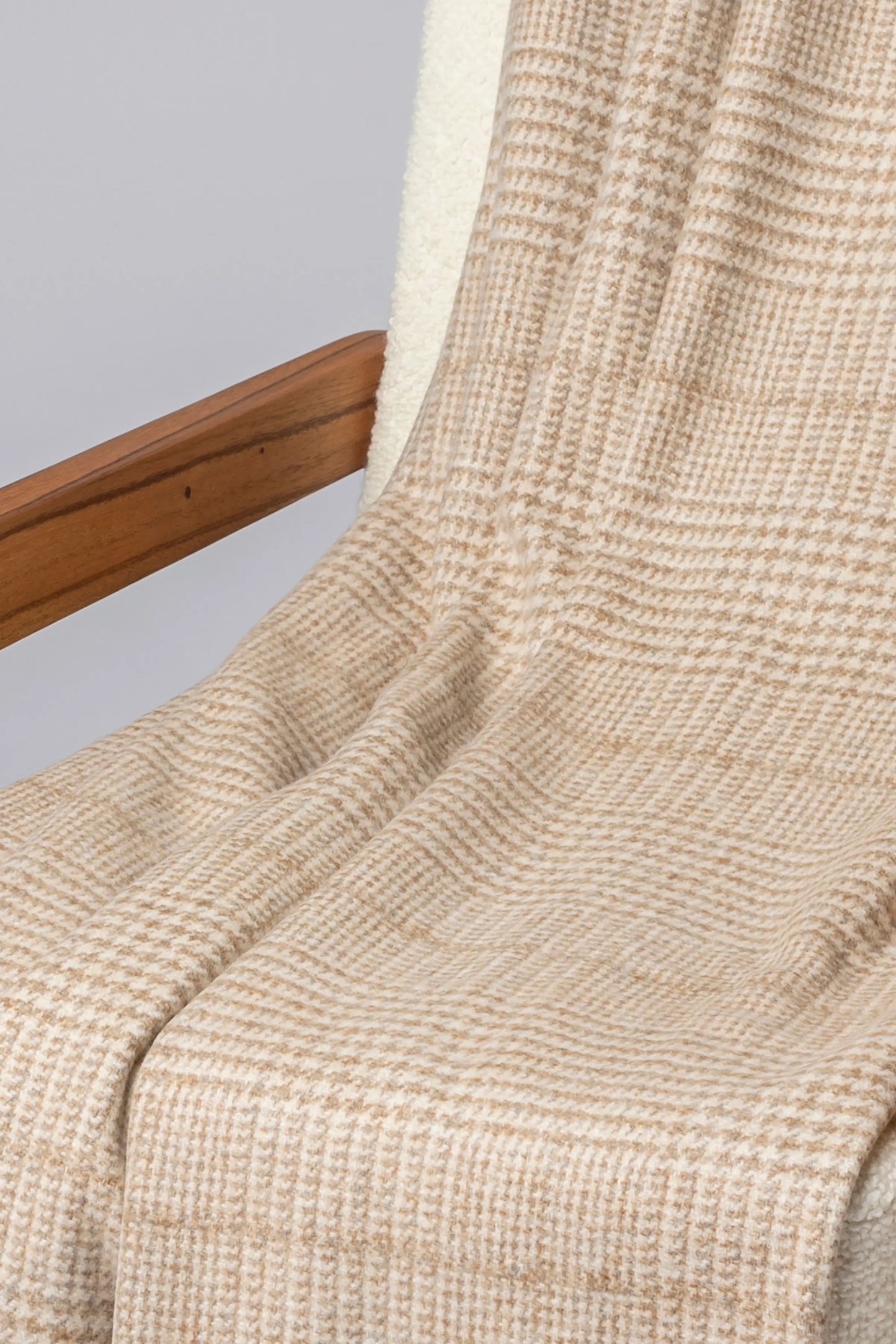 2025 Johnstons of Elgin Interiors Collection Natural Tweed Glen Check Wool Throw on a grey background  WDC01930RU7651ONE