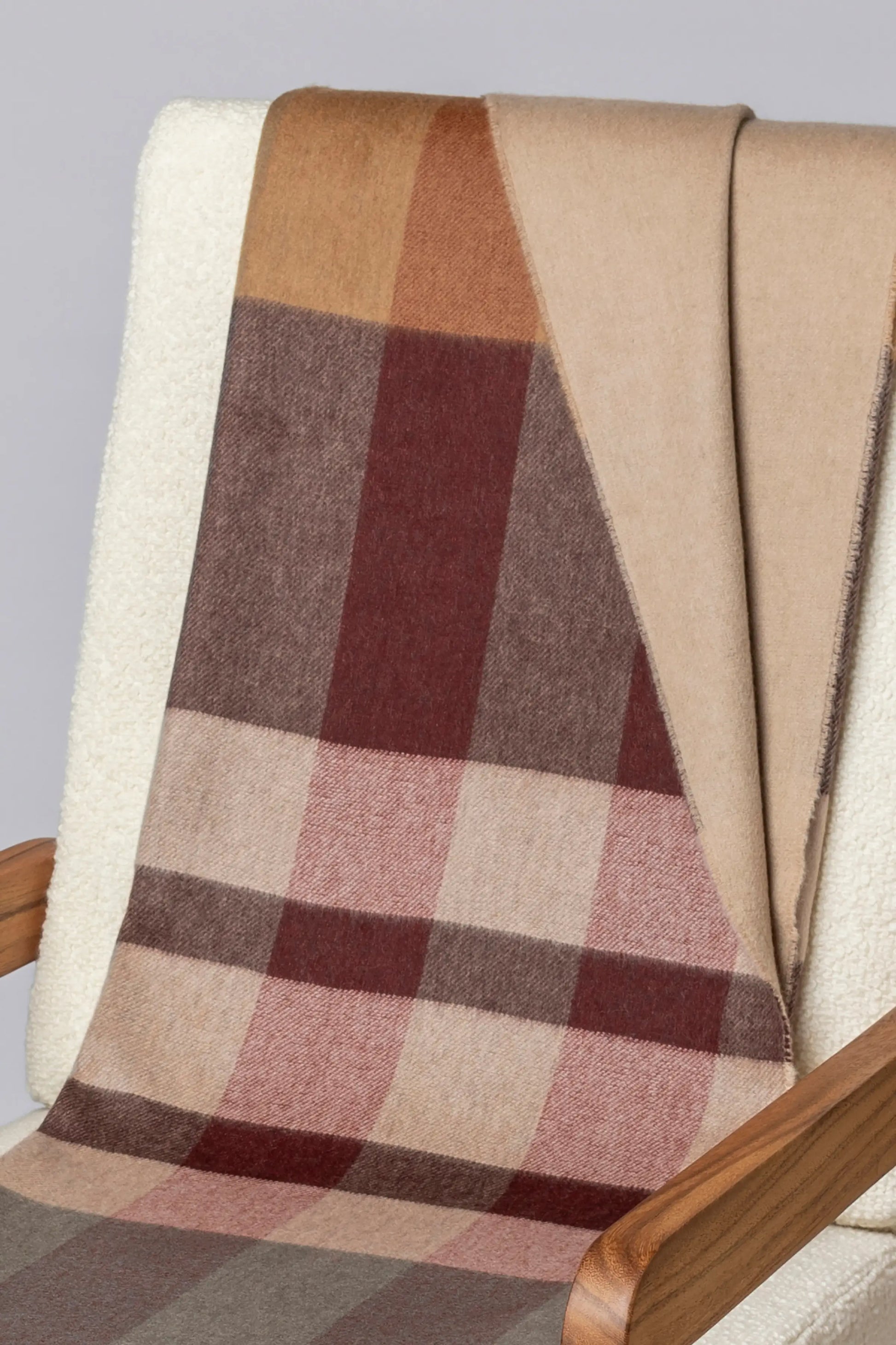 2025 Johnstons of Elgin Interiors Collection Rowan Check Reversible Cashmere Throw on a grey background  WA000013RU7605ONE
