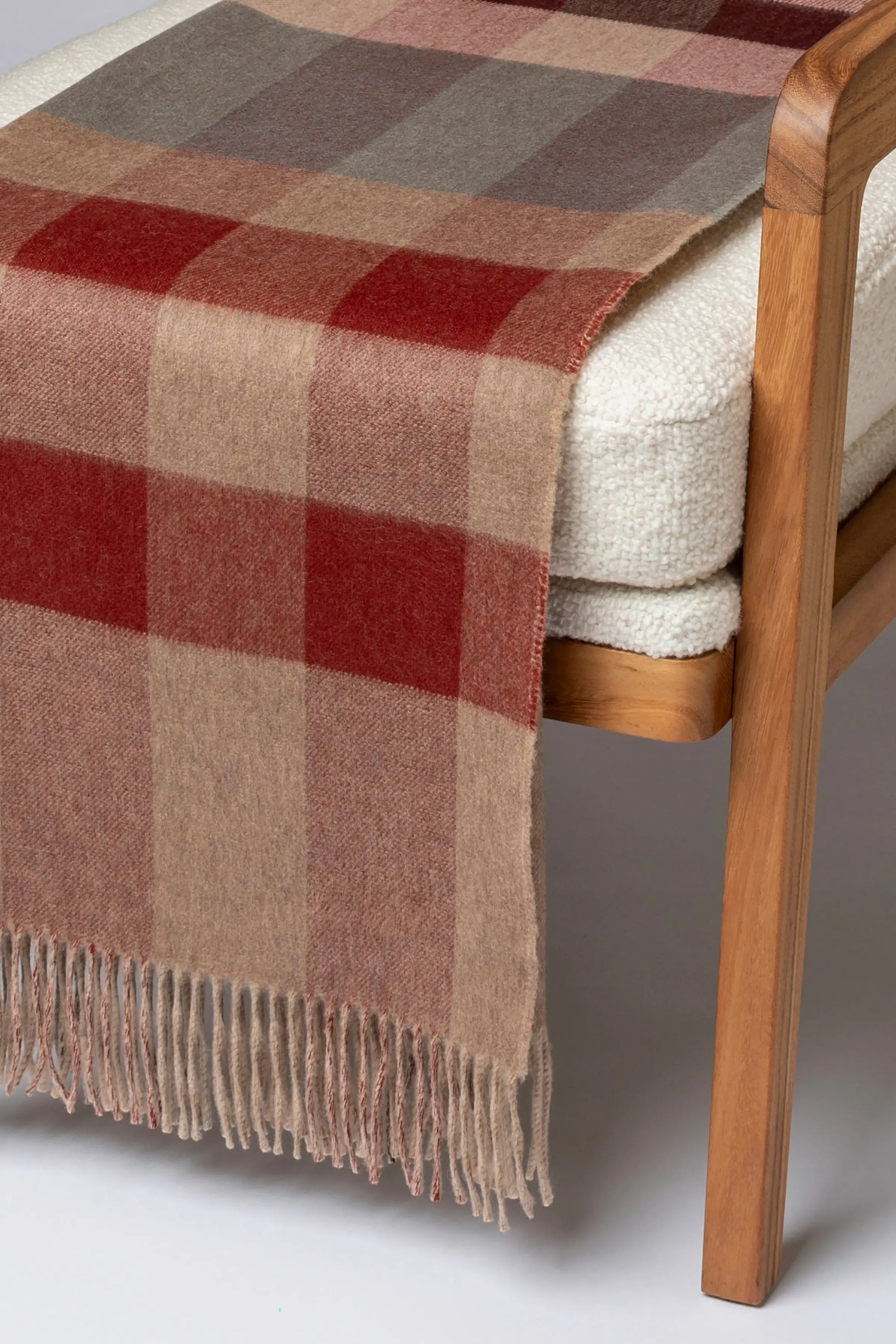 2025 Johnstons of Elgin Interiors Collection Rowan Check Reversible Cashmere Throw on a grey background  WA000013RU7605ONE