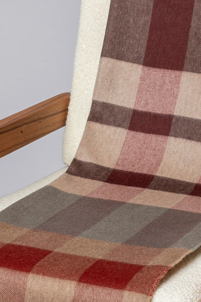 2025 Johnstons of Elgin Interiors Collection Rowan Check Reversible Cashmere Throw on a grey background  WA000013RU7605ONE