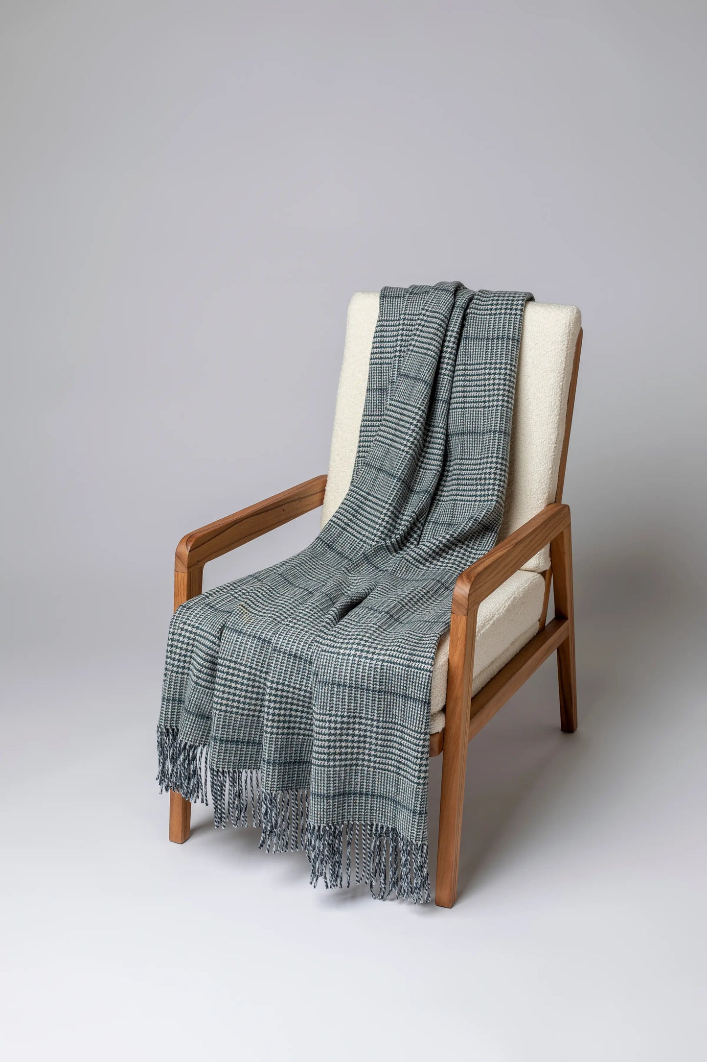 2025 Johnstons of Elgin Interiors Collection Bottle Tweed Glen Check Wool Throw on a grey background  WDC01930RU7652ONE