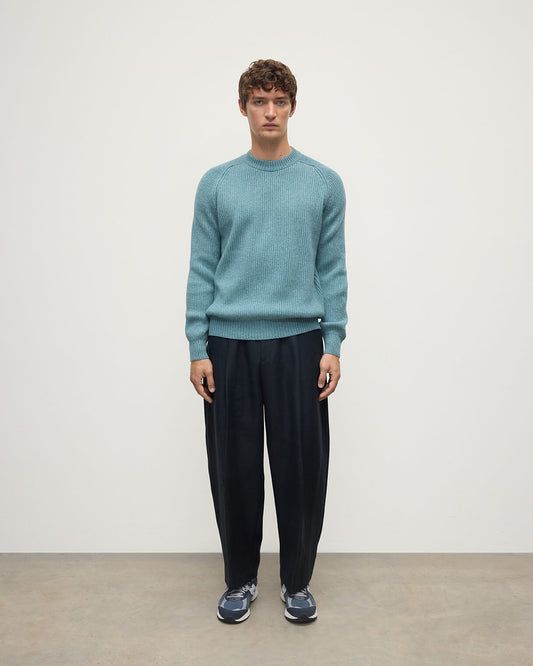 Front view of a model wearing Johnstons of Elgin AW25 Men's Knitwear Seascape & Light Grey Contrast Neck Green Cashmere Jumper KAA05270Q25365