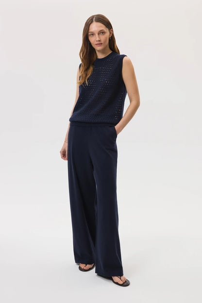 Johnstons of Elgin SS25 Women's Knitwear Navy High Rise Cashmere Culottes worn with navy cashmere mesh tank top  KBP00926SD7286