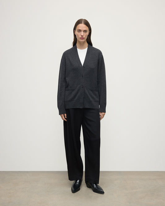 Model wearing Johnstons of Elgin AW25 Women's Knitwear Charcoal Boyfriend-Fit Grey Cashmere Cardigan Front View KAA05560HA7165