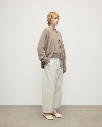 Model wearing Johnstons of Elgin AW25 Women's Knitwear Ash Boyfriend-Fit Brown Cashmere Cardigan Side View KAA05560HB4334