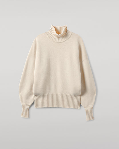 Johnstons of Elgin AW25 Women's Knitwear Champagne High Neck Cream Cashmere Jumper close up  KAA05585SA0502