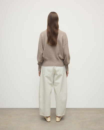 Model wearing Johnstons of Elgin AW25 Women's Knitwear Ash High Neck Brown Cashmere Jumper Back View KAA05585HB4334
