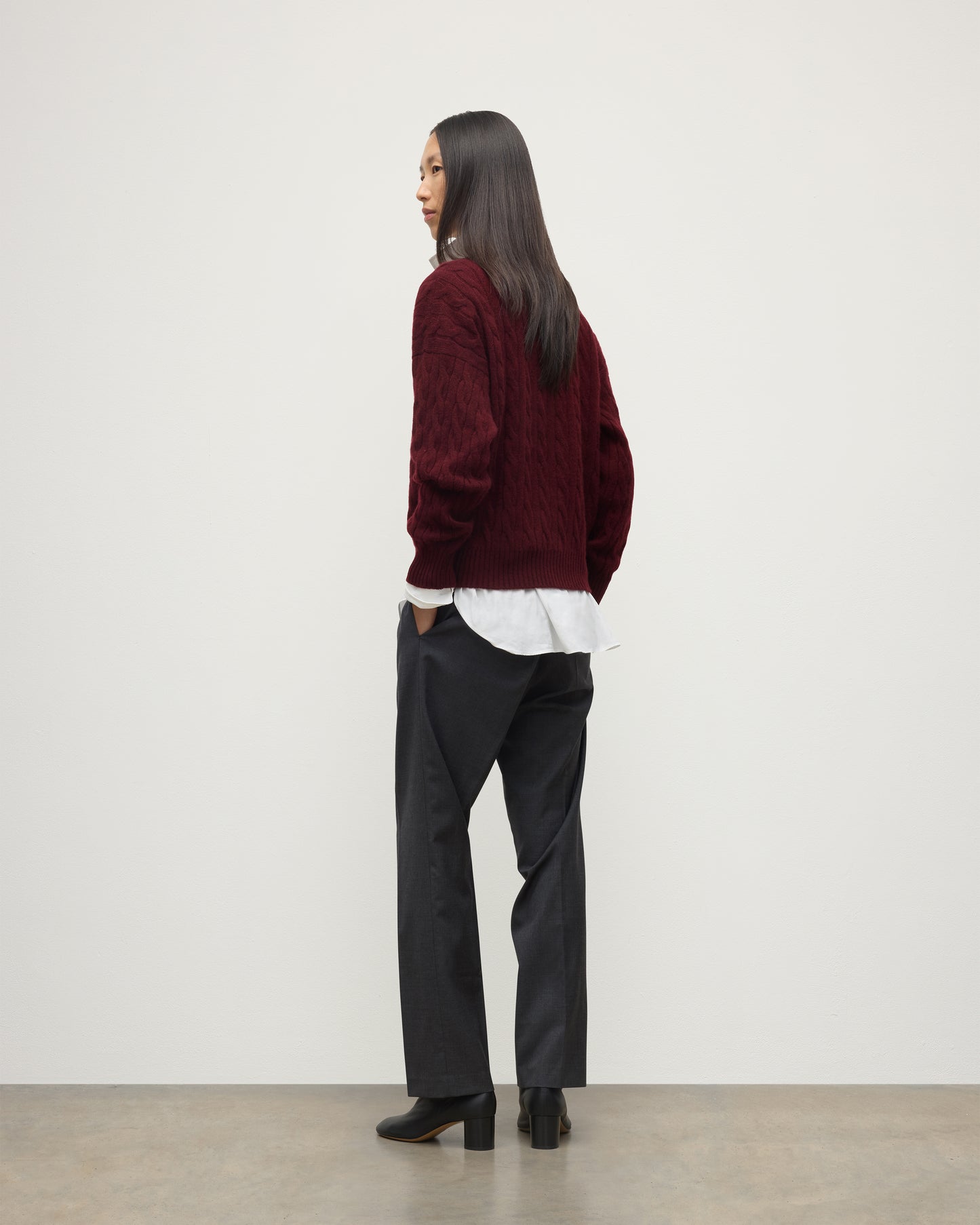 BACK OF WOMENS KYLESKU DEEP VEE SWEATER RED ON A MODEL KAA05728HE7068
