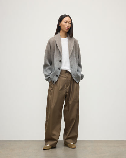 FEMALE MODEL WEARING JOHNSTONS OF ELGIN PIONEER SHAWL CARDIGAN GREY 100% CASHMERE WITH BROWN WIDE LEG CHINO, WHITE T-SHIRT & TRAINERS UAA05750Q25948