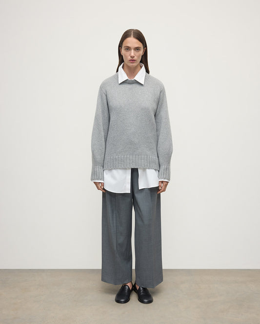 Model wearing Johnstons of Elgin AW25 Women's Knitwear Light Grey Relaxed Grey Cashmere Jumper Front View KAB05562HA0308