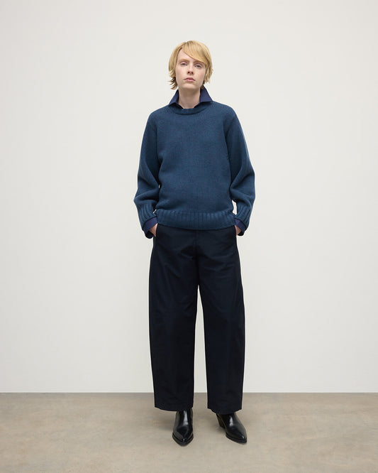 Model wearing Johnstons of Elgin AW25 Women's Knitwear Heather Navy Relaxed Navy Cashmere Jumper Front View KAB05562HD7321