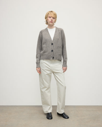 Model wearing Johnstons of Elgin AW25 Women's Knitwear Peregrine Donegal Donegal Cashmere Grey V Neck Cardigan Front View KAC05090006335