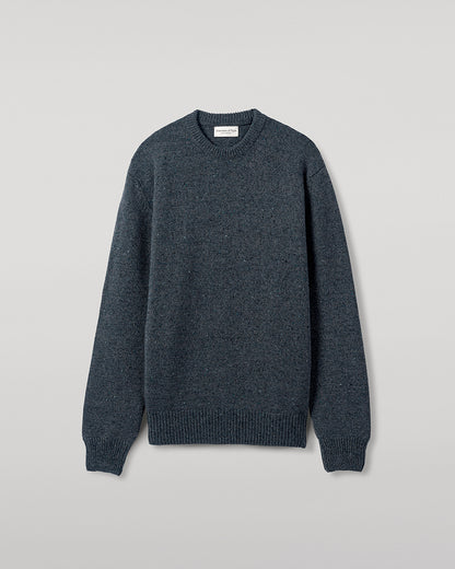 Close up view of a model wearing Johnstons of Elgin AW25 Men's Knitwear Storm Donegal Donegal Cashmere Marl Jumper KAC05287006336