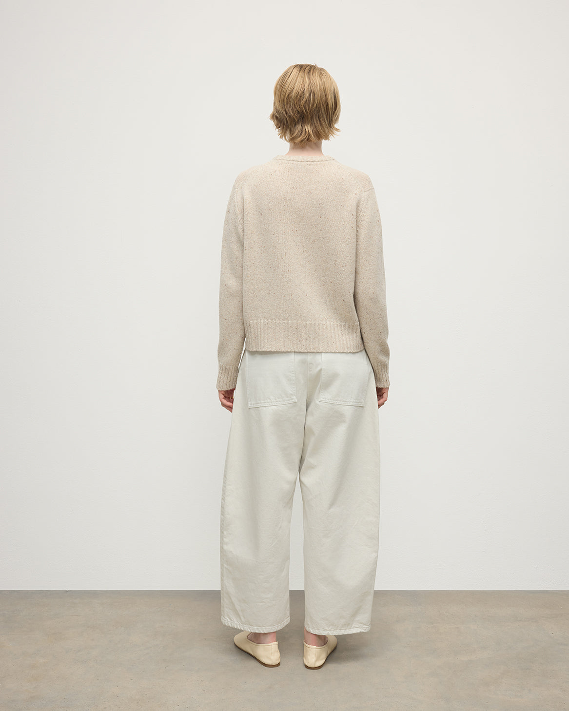 Model wearing Johnstons of Elgin AW25 Women's Knitwear Cream Dun Donegal Donegal Cashmere Cream Jumper Back View KAC05289006334