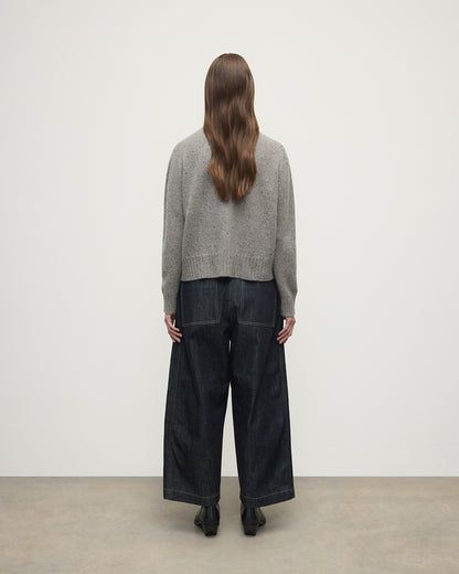 Model wearing Johnstons of Elgin AW25 Women's Knitwear Peregrine Donegal Donegal Cashmere Grey Jumper Back View KAC05289006335