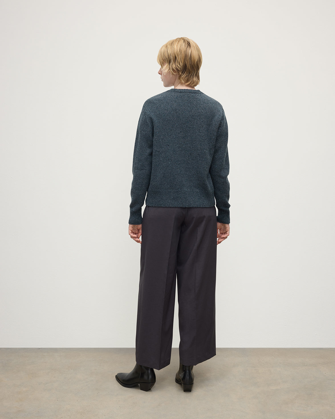 Model wearing Johnstons of Elgin AW25 Women's Knitwear Storm Donegal Donegal Cashmere Blue Cardigan Back View KAC05494006336