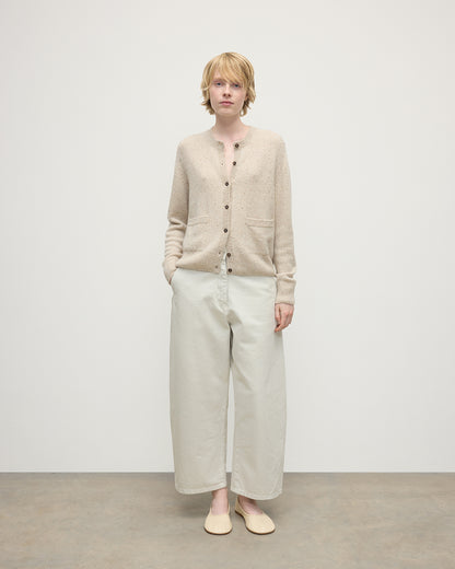 Model wearing Johnstons of Elgin AW25 Women's Knitwear Cream Dun Donegal Donegal Cashmere Cream Cardigan Front View KAC05494006334
