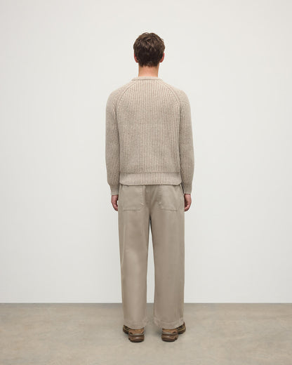 Back view of a model wearing Johnstons of Elgin AW25 Men's Knitwear Cream Dun Donegal & Ash Ribbed Donegal Cashmere Cream Jumper KAC05581Q25394