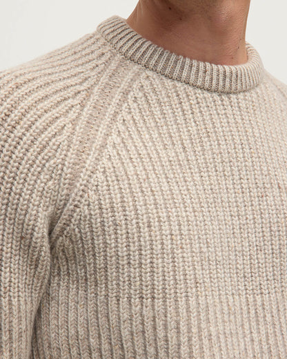 details view of a model wearing Johnstons of Elgin AW25 Men's Knitwear Cream Dun Donegal & Ash Ribbed Donegal Cashmere Cream Jumper KAC05581Q25394