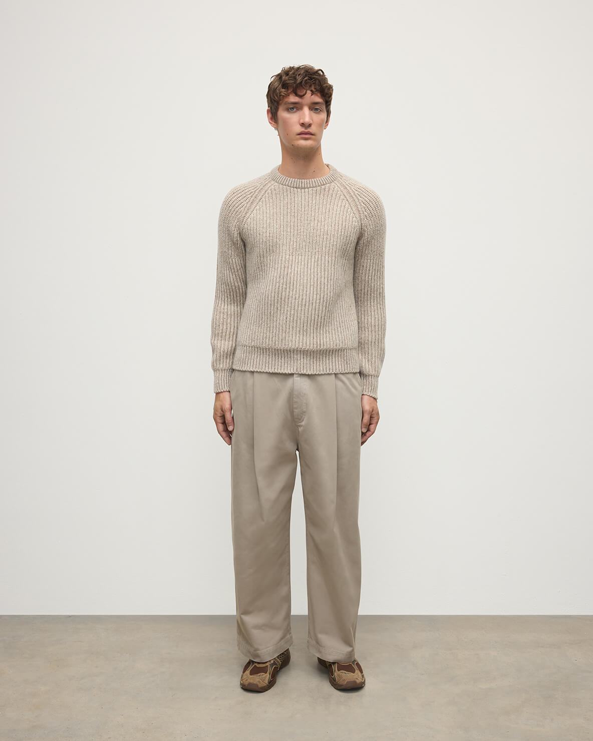 Front view of a model wearing Johnstons of Elgin AW25 Men's Knitwear Cream Dun Donegal & Ash Ribbed Donegal Cashmere Cream Jumper KAC05581Q25394