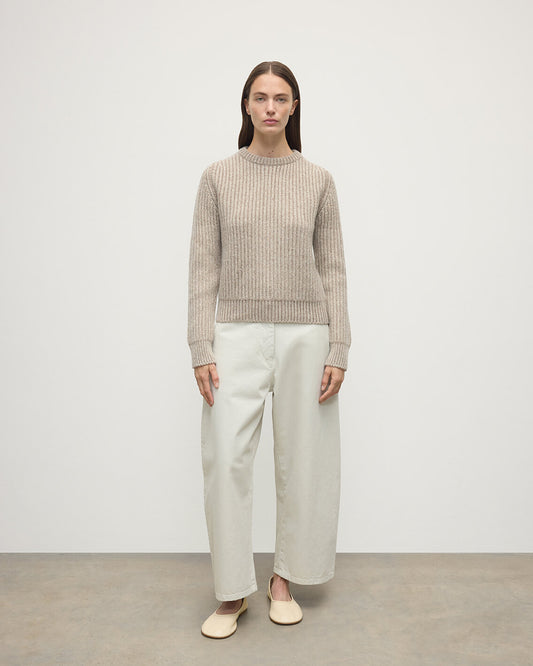 Model wearing Johnstons of Elgin AW25 Women's Knitwear Cream Dun Donegal & Ash High Neck Donegal Cashmere Cream Jumper Front View  KAC05590Q25394
