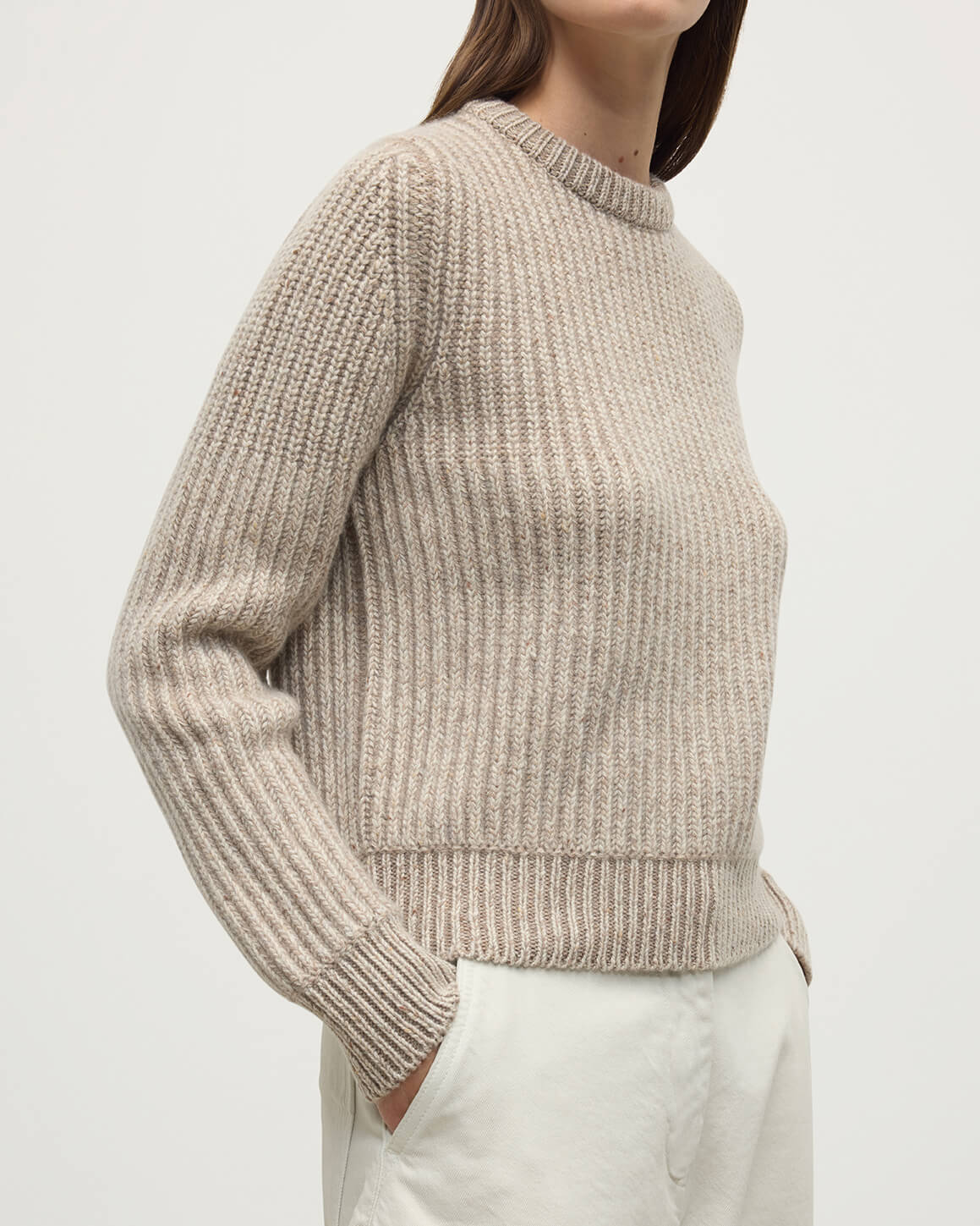 Model wearing Johnstons of Elgin AW25 Women's Knitwear Cream Dun Donegal & Ash High Neck Donegal Cashmere Cream Jumper Close Up KAC05590Q25394
