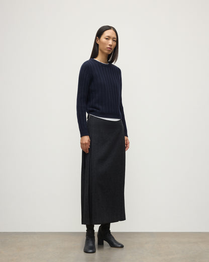 MODEL WEARING JOHNSTONS OF ELGIN WOMENS LECHT CREW SWEATER NAVY WORN WITH LONG LE KILT CHARCOAL KILT 100% CASHMERE KAC05706SD7666