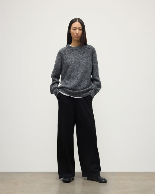 FEMALE MODEL WEARS JOHNSTONS OF ELGIN FYFE CREW SWEATER NAVY 100% CASHMERE WITH BLACK TROUSERS UAC05753006876