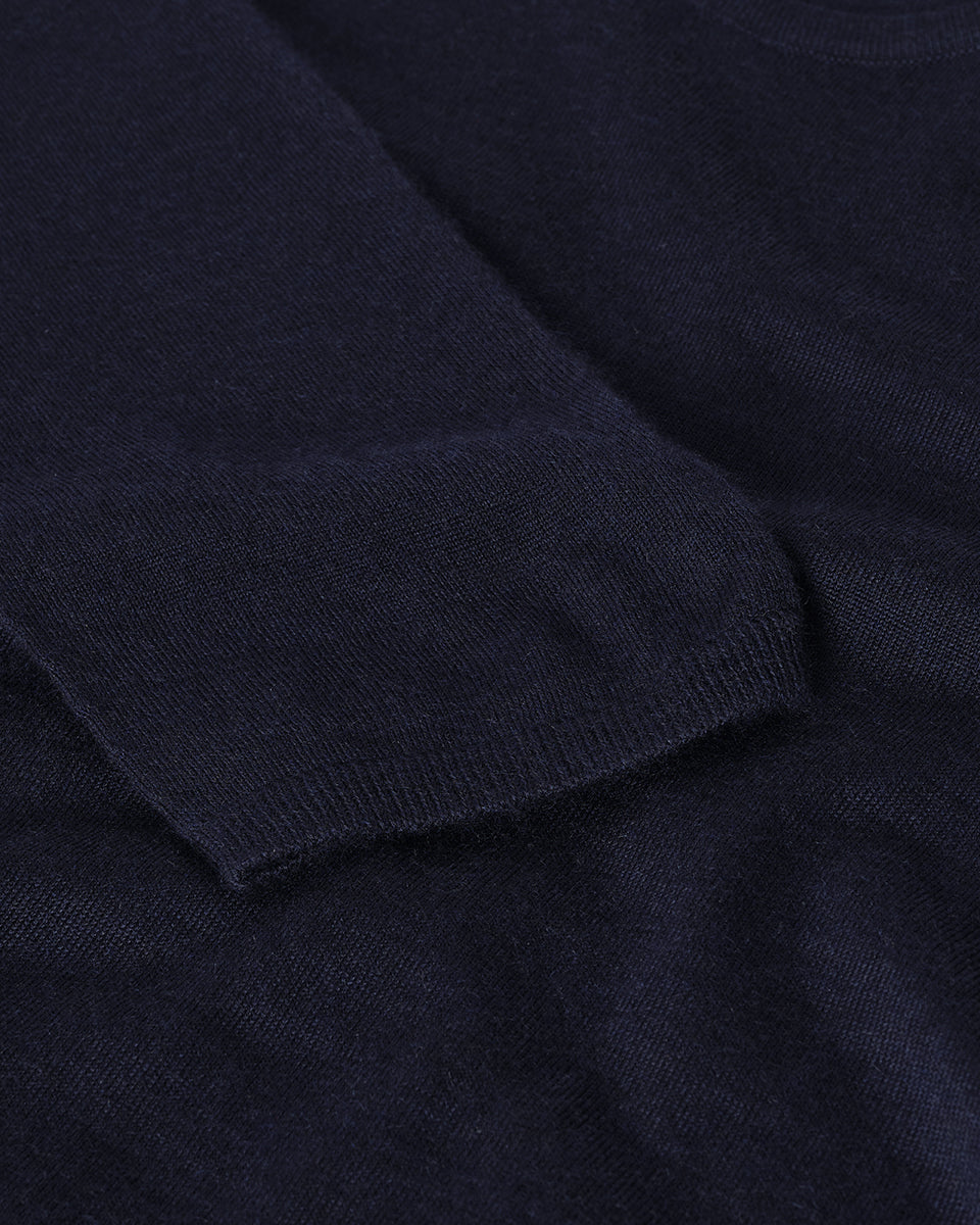 Model wears Johnstons of Elgin AW25 Women's Knitwear Navy Superfine Cashmere Jumper  KAI05318SD7600