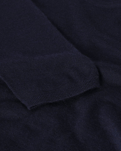 Model wears Johnstons of Elgin AW25 Women's Knitwear Navy Superfine Cashmere Jumper  KAI05318SD7600