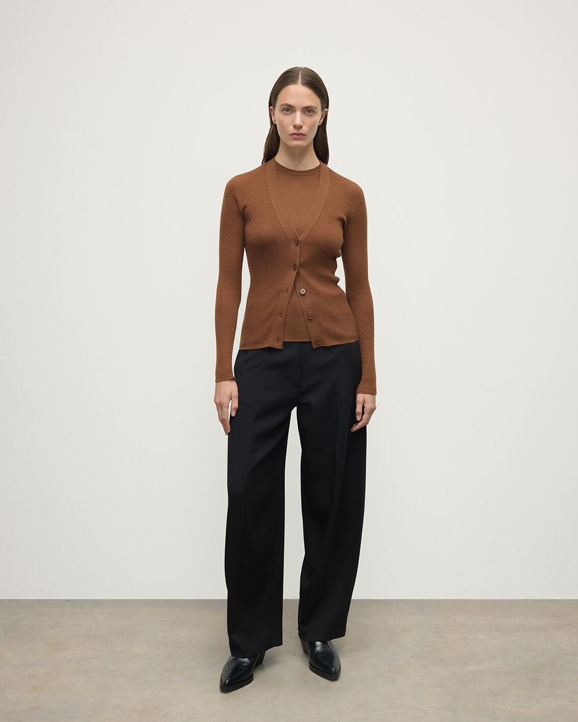 Model wearing Johnstons of Elgin AW25 Women's Knitwear Dark Camel Superfine Cashmere Camel Cardigan Front View KAI05372SB7300