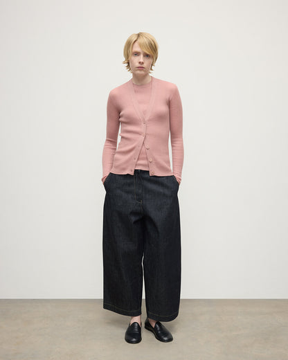 Model wears Johnstons of Elgin AW25 Women's Knitwear Nude Superfine Cashmere Pink Cardigan Front View KAI05372SE5274