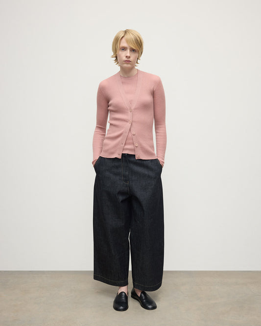 Model wears Johnstons of Elgin AW25 Women's Knitwear Nude Superfine Cashmere Pink Cardigan Front View KAI05372SE5274