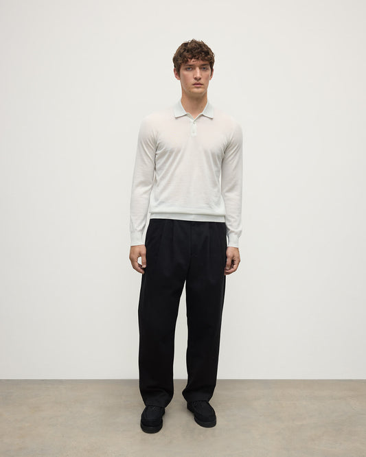 Model wearing Johnstons of Elgin AW25 Men's Knitwear Zinc White White Cashmere Polo Shirt KAI05481HA0327