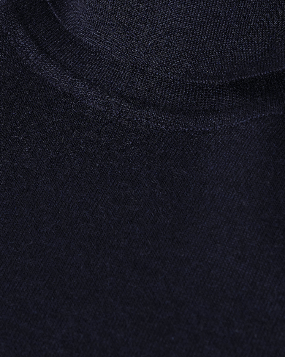 Johnstons of Elgin AW25 Women's Knitwear Dark Navy Superfine Cashmere Navy Roll Neck Jumper Close Up KAI05607SD7600
