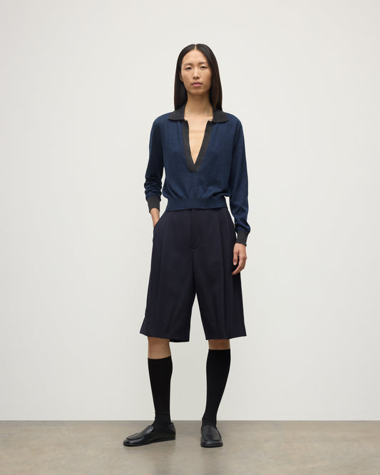 MODEL WEARS JOHNSTONS OF ELGIN WOMENS DEE SHIRT NAVY & GREY 100% SUPERFINE CASHMERE WITH NAVY LONG SHIRTS< SOCKS AND LOAFERS KAI05713Q25962