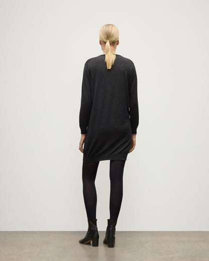 MODEL WEARING JOHNSTONS OF ELGIN WOMENS ELISE VEE SWEATER GREY 100% SUPERFINE CASHMERE WITH BLACK TIGHTS AND BOOTS KAI05715HA7218