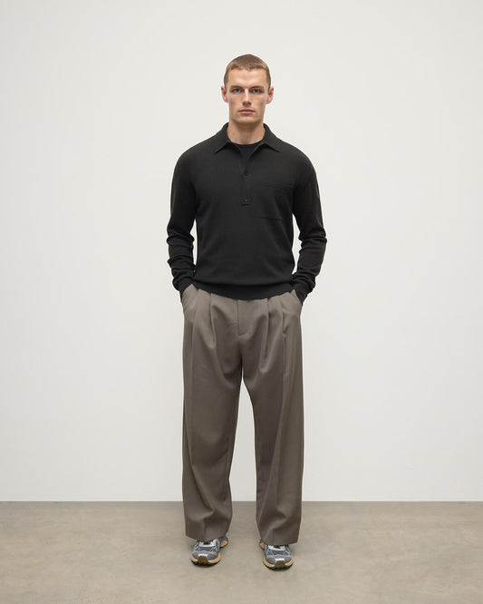 Johnstons of Elgin AW25 Men's Knitwear Iron Cashmere Long Sleeve Grey Poloshirt worn by model front view KAP05268Q25357