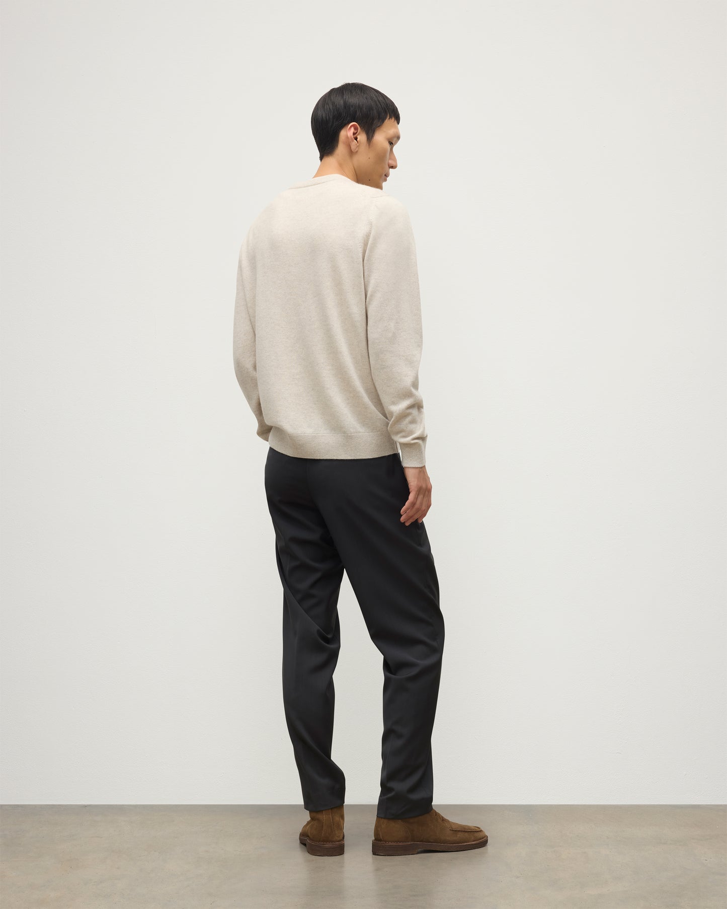 MENS RORY CREW CLASSIC JUMPER NATURAL 100% CASHMERE, BY JOHNSTONS OF ELGIN, WORN WITH GREY TROUSERS AND BROWN LAOFERS KAP05471HA0402
