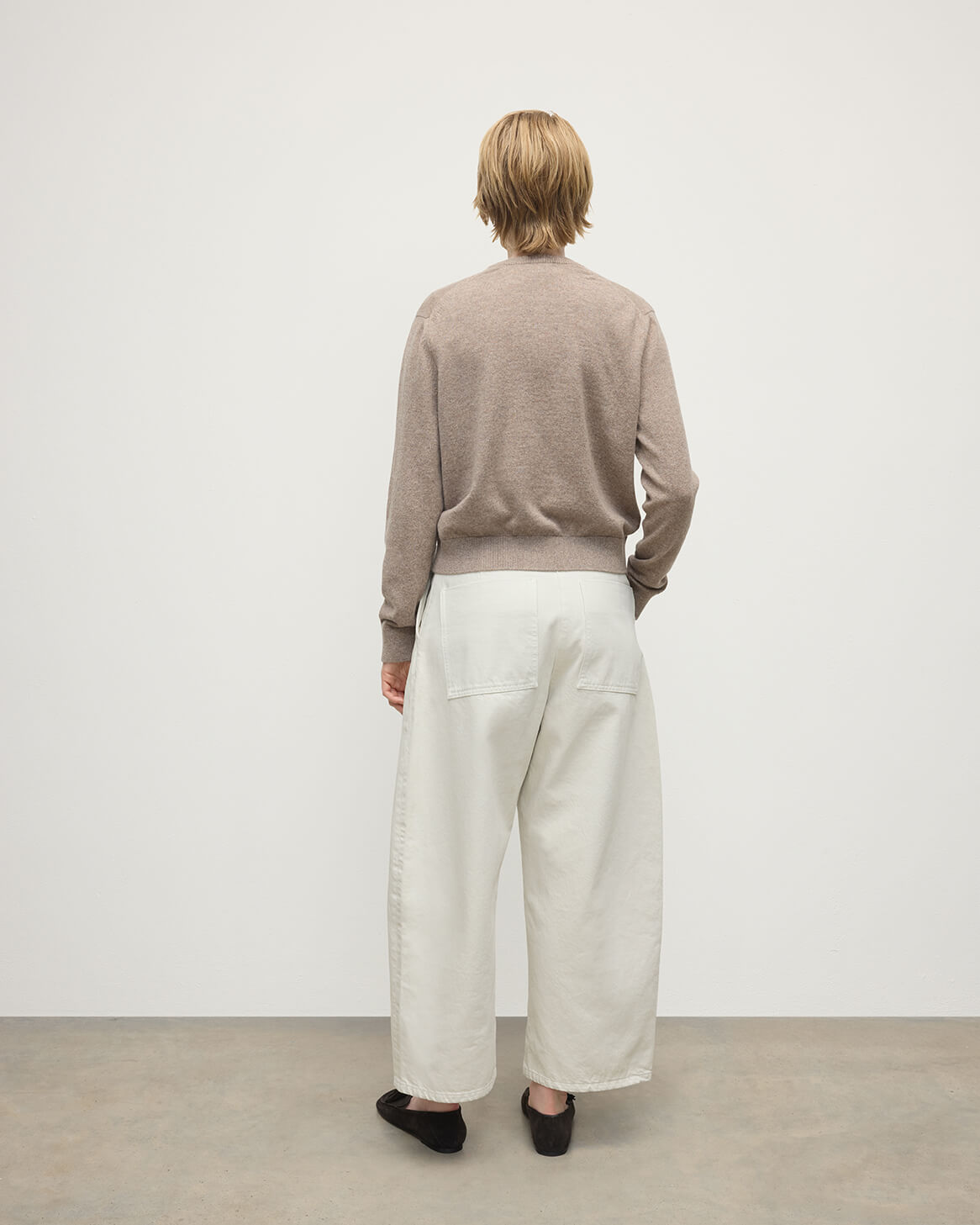 Model wears Johnstons of Elgin AW25 Women's Knitwear Ash Classic Cashmere Brown Cardigan Back KAP05573HB4334
