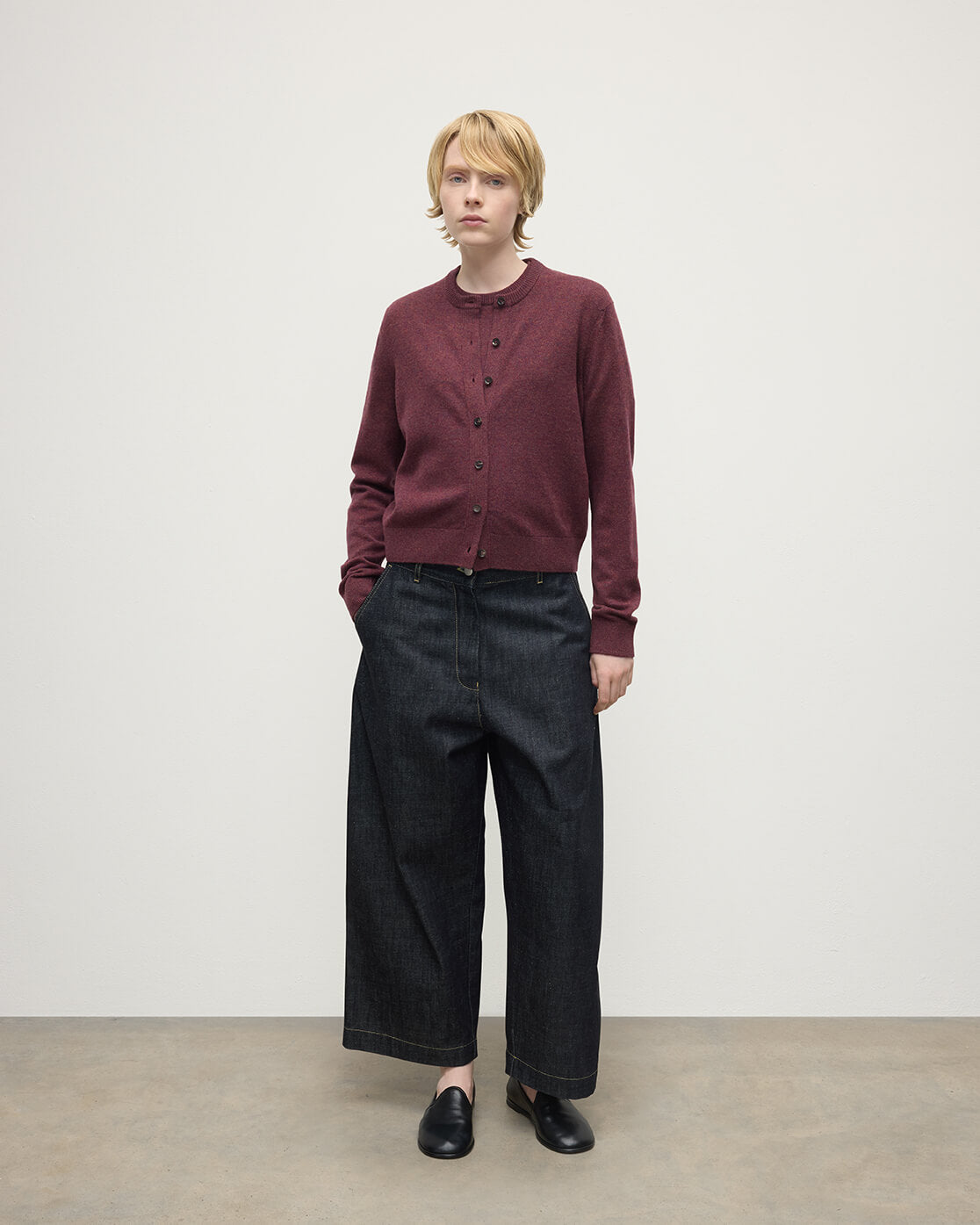 Model wears Johnstons of Elgin AW25 Women's Knitwear Damson Classic Cashmere Purple Cardigan Front KAP05573HE7064