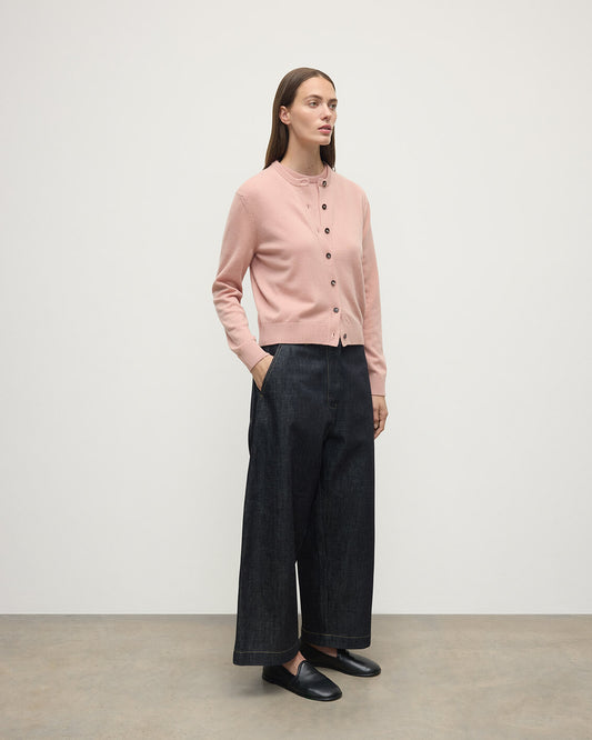 Model wears Johnstons of Elgin AW25 Women's Knitwear Nude Classic Cashmere Pink Cardigan Front KAP05573SE0740