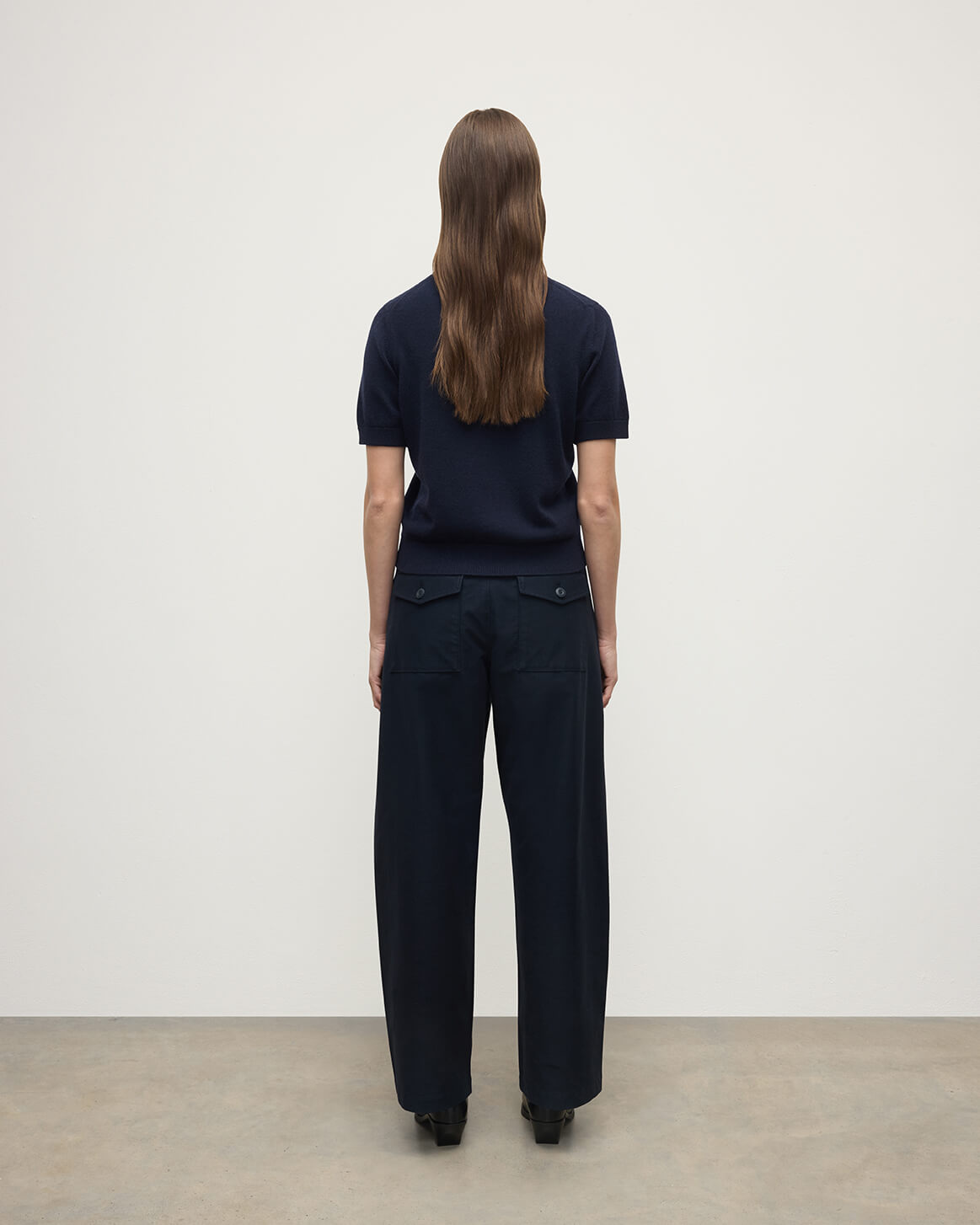 Model wearing Johnstons of Elgin AW25 Women's Knitwear Dark Navy Classic Cashmere Navy T-shirt Back View KAP05574SD7666