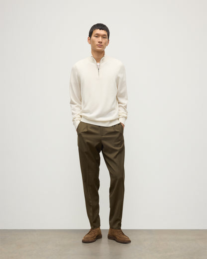 MODEL WEARS JOHNSTONS OF ELGIN MENS RORY CLASSIC HALF ZIP CLASSIC SWEATER 100% CASHMERE OVER A WHITE T0SHIRT WITH OLIVE GREEN TROUSERS KAP05695SA0606